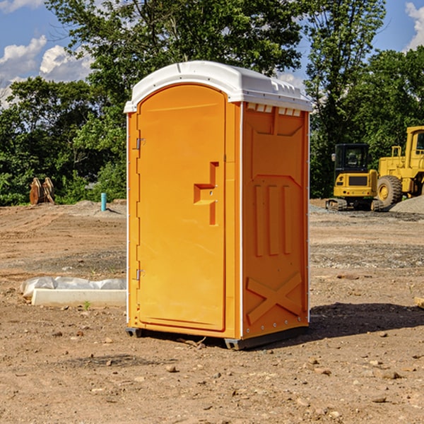 how often are the portable toilets cleaned and serviced during a rental period in Browns Point